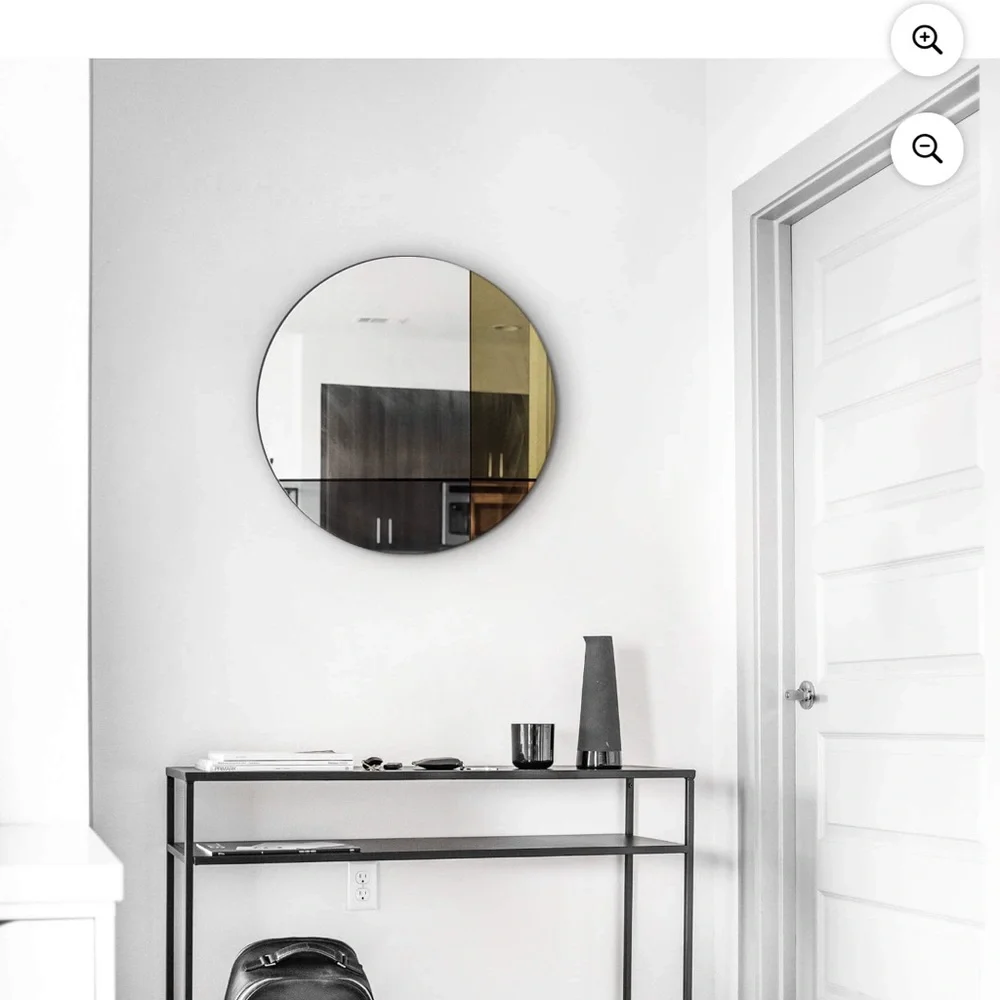 Modern Round Wall Mirror with Black and Gold Accents